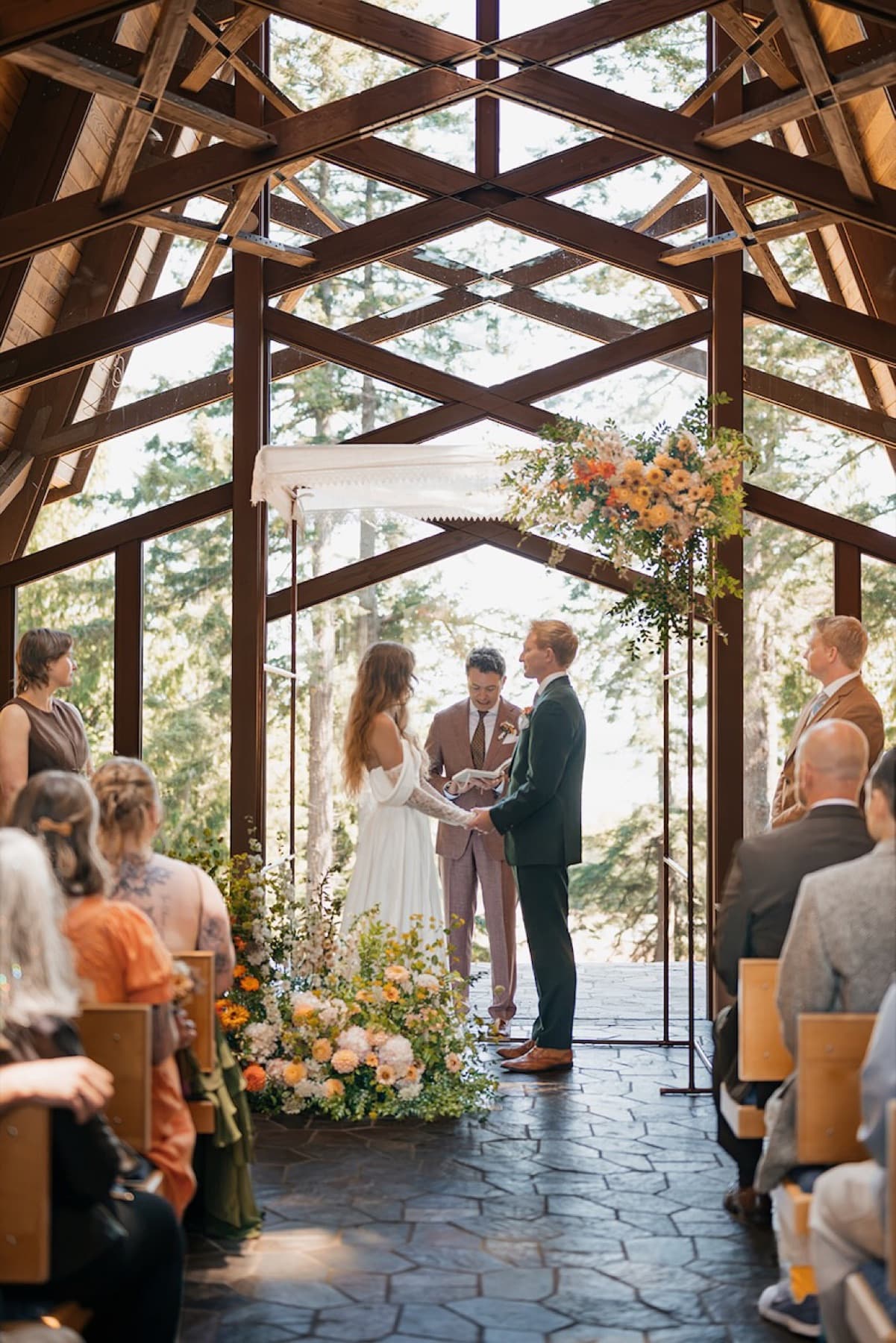 Couple exchanging vows under the chuppah
