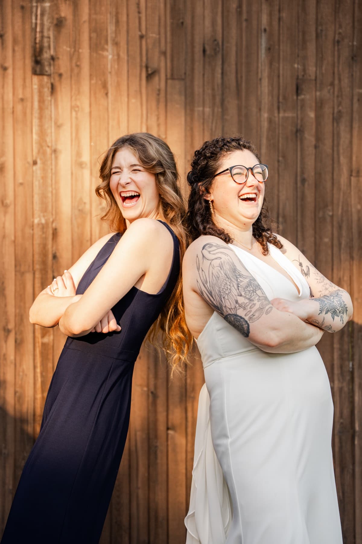 Couple laughing together on their wedding day